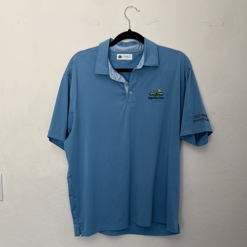 Classic Blue Polo Shirt with Embroidered Emblem